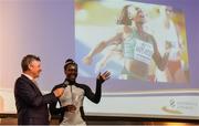 6 December 2017; U20 Athlete of the Year, Gina Akpe-Moses, in conversation with MC Greg Allen after accepting her award during the Irish Life Health National Athletics Awards 2017 at Crowne Plaza in Santry, Dublin. Photo by Piaras Ó Mídheach/Sportsfile