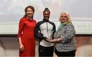 6 December 2017; U20 Athlete of the Year, Gina Akpe-Moses, is presented with her award by Liz Rowen, Head of Marketing for Irish Life Health, left, and Georgina Drumm, President of Athletics Ireland, during the Irish Life Health National Athletics Awards 2017 at Crowne Plaza in Santry, Dublin. Photo by Piaras Ó Mídheach/Sportsfile