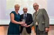 6 December 2017; Outstanding Coach Award winners Hayley and Drew Harrison are presented with their award by Eamon Harvey, Chair of Coaching and Development, right, during the Irish Life Health National Athletics Awards 2017 at Crowne Plaza in Santry, Dublin. Photo by Piaras Ó Mídheach/Sportsfile