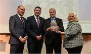 6 December 2017; Hall of Fame award winner Ray Flynn, second from right, is presented with his award by, from left, Jim Dowdall, Managing Director at Irish Life Health, Minister of State at the Department of Transport, Tourism and Sport, Brendan Griffin T.D, and Georgina Drumm, President of Athletics Ireland, during the Irish Life Health National Athletics Awards 2017 at Crowne Plaza in Santry, Dublin. Photo by Piaras Ó Mídheach/Sportsfile