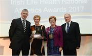 6 December 2017; Masters Services winner Eveilin McNeilis is presented with her award by from left, George Maybury, Chaiman of Finance Committee Athletics Ireland, Mayor of Fingal Mary McCamley, and Seán McMullen, President of the Masters Athletic Association during the Irish Life Health National Athletics Awards 2017 at Crowne Plaza in Santry, Dublin. Photo by Piaras Ó Mídheach/Sportsfile