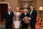8 December 2017; Galway's Johnny Coen, carrying the Liam MacCarthy Cup, and manager Micheál Donoghue are welcomed by the President of Ireland Michael D Higgins and his wife Sabina during the GAA Hurling All-Ireland Senior & Minor Champions visit to Áras an Uachtaráin in Phoenix Park, Dublin. Photo by Stephen McCarthy/Sportsfile