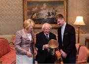 8 December 2017; Galway minor captain Darren Morrissey, accompanied by the The Irish Press Cup, is welcomed by the President of Ireland Michael D Higgins and his wife Sabina during the GAA Hurling All-Ireland Senior & Minor Champions visit to Áras an Uachtaráin in Phoenix Park, Dublin. Photo by Stephen McCarthy/Sportsfile