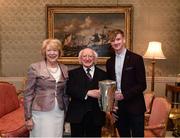 8 December 2017; Galway minor captain Darren Morrissey, accompanied by the The Irish Press Cup, is welcomed by the President of Ireland Michael D Higgins and his wife Sabina during the GAA Hurling All-Ireland Senior & Minor Champions visit to Áras an Uachtaráin in Phoenix Park, Dublin. Photo by Stephen McCarthy/Sportsfile