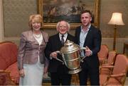 8 December 2017; Galway's Davy Glennon, carrying the Bob O'Keeffe Cup, is welcomed by the President of Ireland Michael D Higgins and his wife Sabina during the GAA Hurling All-Ireland Senior & Minor Champions visit to Áras an Uachtaráin in Pheonix Park, Dublin. Photo by Stephen McCarthy/Sportsfile