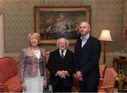 8 December 2017; Galway's Derek Forde is welcomed by the President of Ireland Michael D Higgins and his wife Sabina during the GAA Hurling All-Ireland Senior & Minor Champions visit to Áras an Uachtaráin in Phoenix Park, Dublin. Photo by Stephen McCarthy/Sportsfile