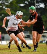 9 December 2017; Padraig Walsh of 2016 PwC All Star Team in action against Matthew O'Hanlon of 2017 PwC All Star Team during the PwC All Star 2017 - All Star Hurling game at the Singapore Recreation Club, The Pandang, in Singapore. Photo by Ray McManus/Sportsfile