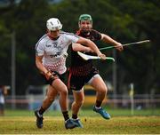 9 December 2017; Patrick Bonner Maher of 2016 PwC All Star Team in action against Noel McGrath of 2017 PwC All Star Team during the PwC All Star Tour 2017 - All Star Hurling game at the Singapore Recreation Club, The Pandang, in Singapore. Photo by Ray McManus/Sportsfile