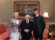 8 December 2017; Galway's Conor Elwood is welcomed by the President of Ireland Michael D Higgins and his wife Sabina during the GAA Hurling All-Ireland Senior & Minor Champions visit to Áras an Uachtaráin in Phoenix Park, Dublin. Photo by Stephen McCarthy/Sportsfile
