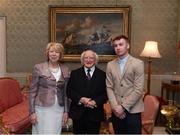 8 December 2017; Galway's Donal Mannion is welcomed by the President of Ireland Michael D Higgins and his wife Sabina during the GAA Hurling All-Ireland Senior & Minor Champions visit to Áras an Uachtaráin in Phoenix Park, Dublin. Photo by Stephen McCarthy/Sportsfile