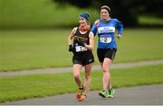 9 December 2017; Veronica Burke, of Ballinasloe Athletic Club, Co Galway, first place finisher, left, and Kate Veale, of West Waterford AC, second place finisher, during the Senior Women's event of the Irish Life Health National 20k Race Walking Championships at St Anne's Park in Raheny, Dublin. Photo by Piaras Ó Mídheach/Sportsfile