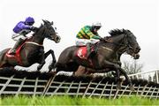 10 December 2017; Aa Bee See with Mark Walsh up jump the last ahead of Mary Frances with Robbie Power up on their way to winning the 3 For 2 Festival Tickets @ punchestown.com Handicap Hurdle at Punchestown Racecourse in Naas, Co Kildare. Photo by Cody Glenn/Sportsfile