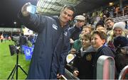 10 December 2017; Jonathan Sexton of Leinster takes a 'selfie' with young Exeter fans after the European Rugby Champions Cup Pool 3 Round 3 match between Exeter Chiefs and Leinster at Sandy Park in Exeter, England.  Photo by Brendan Moran/Sportsfile