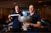 11 December 2017; The hotly anticipated draw for the Bank of Ireland Leinster Schools Cup took place this evening as the junior and senior schools teams going head-to-head next year were revealed. Leinster senior coach Stuart Lancaster, along with players Dan Leavy and Dave Kearney were on hand for the draw and the event was streamed via Facebook Live from Bank of Ireland Grand Canal Dock Branch in Dublin to eagerly awaiting student players, families and fans. Bank of Ireland has proudly partnered with Leinster Rugby since 2007 and recently announced a five year extension of their sponsorship through to the 2023 season. The partnership encompasses all Leinster Rugby activity, from the professional team right through to grassroots community, club and schools level. Pictured at the Leinster Rugby Schools Cup Draw in Bank of Ireland, Grand Canal Dock are Leinster senior coach Stuart Lancaster, right, and Dan Leavy of Leinster, and a former St Michael's College pupil. Photo by Ramsey Cardy/Sportsfile