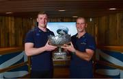 11 December 2017; The hotly anticipated draw for the Bank of Ireland Leinster Schools Cup took place this evening as the junior and senior schools teams going head-to-head next year were revealed. Leinster senior coach Stuart Lancaster, along with players Dan Leavy and Dave Kearney were on hand for the draw and the event was streamed via Facebook Live from Bank of Ireland Grand Canal Dock Branch in Dublin to eagerly awaiting student players, families and fans. Bank of Ireland has proudly partnered with Leinster Rugby since 2007 and recently announced a five year extension of their sponsorship through to the 2023 season. The partnership encompasses all Leinster Rugby activity, from the professional team right through to grassroots community, club and schools level. Pictured at the Leinster Rugby Schools Cup Draw in Bank of Ireland, Grand Canal Dock are Leinster senior coach Stuart Lancaster, right, and Dan Leavy of Leinster, and a former St Michael's College pupil. Photo by Ramsey Cardy/Sportsfile