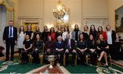 11 December 2017; President of Ireland Michael D Higgins with members of the Dublin Ladies football team and backroom staff during the Dublin Senior Men's and Ladies Football squads visit to Áras an Uachtaráin in Phoenix Park, Dublin. Photo by Piaras Ó Mídheach/Sportsfile