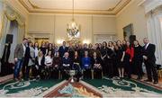 11 December 2017; President of Ireland Michael D Higgins with members of the Dublin Ladies football team and backroom staff during the Dublin Senior Men's and Ladies Football squads visit to Áras an Uachtaráin in Phoenix Park, Dublin. Photo by Piaras Ó Mídheach/Sportsfile