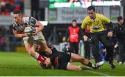 15 December 2017; John Cooney of Ulster is tackled by Charlie Walker of Harlequins during the European Rugby Champions Cup Pool 1 Round 4 match between Ulster and Harlequins at the Kingspan Stadium in Belfast. Photo by Ramsey Cardy/Sportsfile