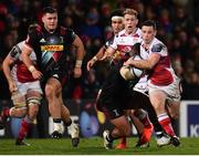 15 December 2017; John Cooney of Ulster is tackled by Kyle Sinckler of Harlequins during the European Rugby Champions Cup Pool 1 Round 4 match between Ulster and Harlequins at the Kingspan Stadium in Belfast. Photo by Ramsey Cardy/Sportsfile
