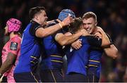 16 December 2017; Luke McGrath of Leinster celebrates with team-mates James Ryan, left, and Dan Leavy, right, after scoring his side's first try during the European Rugby Champions Cup Pool 3 Round 4 match between Leinster and Exeter Chiefs at the Aviva Stadium in Dublin. Photo by Ramsey Cardy/Sportsfile