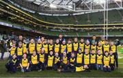16 December 2017; The Clondalkin RFC team with Leinster's Barry Daly and Noel Reid prior to the Bank of Ireland Half-Time Minis at the European Rugby Champions Cup Pool 3 Round 4 match between Leinster and Exeter Chiefs at the Aviva Stadium in Dublin. Photo by Stephen McCarthy/Sportsfile