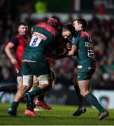 17 December 2017; Darren Sweetnam of Munster is tackled by Sione Kalamafoni and George Ford of Leicester Tigers during the European Rugby Champions Cup Pool 4 Round 4 match between Leicester Tigers and Munster at Welford Road in Leicester, England. Photo by Brendan Moran/Sportsfile