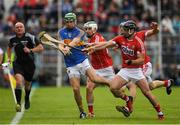 21 May 2017; Noel McGrath of Tipperary in action against Colm Spillane, Shane Kingston and Bill Cooper of Cork during the Munster GAA Hurling Senior Championship Semi-Final match between Tipperary and Cork at Semple Stadium in Thurles, Co Tipperary. Photo by Ray McManus/Sportsfile