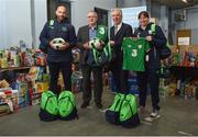 20 December 2017; FAI CEO John Delaney, along with Republic of Ireland Under 16 manager Paul Osam and Women's U16 manager Sharon Boyle, hand over Ireland bags full with jerseys, footballs & other merchandise to Liam Casey, East Region President, of the St Vincent De Paul as part of a Christmas donation for families in need. Pictured at the St Vincent De Paul National Office on Sean McDermott Street in Dublin. Photo by Seb Daly/Sportsfile