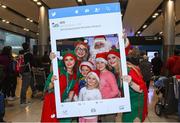 21 December 2017; The annual migration home for Christmas is now in full swing, with passenger arrivals in Dublin airport increasing each day right up until Saturday 23rd December. It’s a very emotional and joyous occasion for families, separated by distance throughout the year but reuniting in the Arrivals hall in Dublin Airport to celebrate Christmas. OCS Ireland will be there on the ground over the entire holiday period. Assisting passengers through its Reduced Mobility Service (PRM) thus allowing the passengers to saviour the occasion and the joy of coming home for Christmas. In 2017 OCS assisted in excess of 290,000 passengers. The specially trained Care Agents will ensure a safe journey through the airport this Christmas for passengers who require assistance of any kind with the few to reducing fear and anxiety while navigating the airport. Pictured are 4 year old Nora MacAvock with her brother Jack, age 7, and Katie, age 9, with Santa Claus and his Elves at Dublin Airport in Dublin. Photo by Matt Browne/Sportsfile