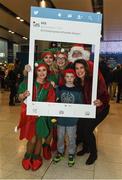 21 December 2017; The annual migration home for Christmas is now in full swing, with passenger arrivals in Dublin airport increasing each day right up until Saturday 23rd December. It’s a very emotional and joyous occasion for families, separated by distance throughout the year but reuniting in the Arrivals hall in Dublin Airport to celebrate Christmas. OCS Ireland will be there on the ground over the entire holiday period. Assisting passengers through its Reduced Mobility Service (PRM) thus allowing the passengers to saviour the occasion and the joy of coming home for Christmas. In 2017 OCS assisted in excess of 290,000 passengers. The specially trained Care Agents will ensure a safe journey through the airport this Christmas for passengers who require assistance of any kind with the few to reducing fear and anxiety while navigating the airport. Pictured are Cian Tobin, age 6, and his mother Jacinta, from San Francisco, USA, with Santa Claus and his Elves at Dublin Airport in Dublin. Photo by Matt Browne/Sportsfile