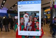 21 December 2017; The annual migration home for Christmas is now in full swing, with passenger arrivals in Dublin airport increasing each day right up until Saturday 23rd December. It’s a very emotional and joyous occasion for families, separated by distance throughout the year but reuniting in the Arrivals hall in Dublin Airport to celebrate Christmas. OCS Ireland will be there on the ground over the entire holiday period. Assisting passengers through its Reduced Mobility Service (PRM) thus allowing the passengers to saviour the occasion and the joy of coming home for Christmas. In 2017 OCS assisted in excess of 290,000 passengers. The specially trained Care Agents will ensure a safe journey through the airport this Christmas for passengers who require assistance of any kind with the few to reducing fear and anxiety while navigating the airport. Pictured are Sara Keavney and her 3 month old son Eli with Santa Claus and his Elves at Dublin Airport in Dublin. Photo by Matt Browne/Sportsfile