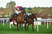 26 December 2017; Sparky Stowaway, left, with Sean McDermott up, races ahead of Banksoftheshannon, with Mark Enright up, on their way to winning the Cardinal Capital Handicap Hurdle on day 1 of the Leopardstown Christmas Festival at Leopardstown in Dublin. Photo by Barry Cregg/Sportsfile