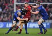 26 December 2017; Andrew Conway of Munster is tackled by Devin Toner, left, and Dan Leavy of Leinster  during the Guinness PRO14 Round 11 match between Munster and Leinster at Thomond Park in Limerick. Photo by Brendan Moran/Sportsfile