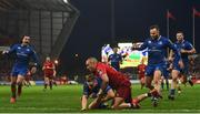 26 December 2017; Jordan Larmour of Leinster scores his side's fourth try despite the tackle of Simon Zebo of Munster during the Guinness PRO14 Round 11 match between Munster and Leinster at Thomond Park in Limerick. Photo by Ramsey Cardy/Sportsfile