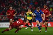 26 December 2017; Jordan Larmour of Leinster beats the tackle by Ian Keatley of Munster on his way to scoring his side's fourth try during the Guinness PRO14 Round 11 match between Munster and Leinster at Thomond Park in Limerick. Photo by Ramsey Cardy/Sportsfile