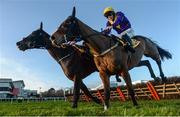 29 December 2017; Mick Jazz, with Davy Russell up, left, jumps the last ahead of Cilaos Emery, with David Mullins up, on their way to winning the Ryanair Hurdle on day 4 of the Leopardstown Christmas Festival at Leopardstown in Dublin. Photo by David Fitzgerald/Sportsfile