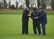 30 December 2017; Westmeath mentors, from left, Michael Ryan, Michael Walsh and Alan Mangan talk tactics prior to the Bord na Móna Walsh Cup Group 4 First Round match between Offaly and Westmeath at St Rynagh’s GAA club in Offaly. Photo by Seb Daly/Sportsfile