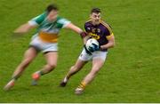 30 December 2017; Craig McCabe of Wexford in action against Daithí Brady of Offaly during the Bord na Móna O’Byrne Cup Group 1 First Round match between Offaly and Wexford at Bord na Móna O'Connor Park in Tullamore, Co Offaly. Photo by Piaras Ó Mídheach/Sportsfile