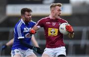 30 December 2017; Killian Daly of Westmeath is tackled by Aaron Dowling of Laois during the Bord na Móna O’Byrne Cup Group 4 First Round match between Westmeath and Laois at TEG Cusack Park in Westmeath. Photo by Ramsey Cardy/Sportsfile