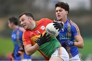 30 December 2017; Darragh Foley of Carlow in action against Ross O'Brien of Wicklow during the Bord na Móna O'Byrne Cup Group 3 First Round match between Wicklow and Carlow at Bray Emmets GAA Club, Bray in Wicklow. Photo by Matt Browne/Sportsfile