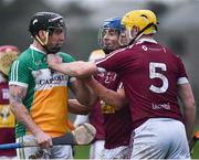 30 December 2017; Shane Dooley of Offaly tussles with Gary Greville, centre, and Aaron Craig, right, of Westmeath during the Bord na Móna Walsh Cup Group 4 First Round match between Offaly and Westmeath at St Rynagh’s GAA club in Offaly. Photo by Seb Daly/Sportsfile