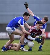 30 December 2017; Ciaran Shanley of Westmeath is tackled by Ruaidhrí Fennell, left, and Trevor Collins of Laois during the Bord na Móna O’Byrne Cup Group 4 First Round match between Westmeath and Laois at TEG Cusack Park in Westmeath. Photo by Ramsey Cardy/Sportsfile