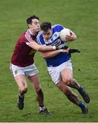 30 December 2017; John O'Loughlin of Laois is tackled by Sam Duncan of Westmeath during the Bord na Móna O’Byrne Cup Group 4 First Round match between Westmeath and Laois at TEG Cusack Park in Westmeath. Photo by Ramsey Cardy/Sportsfile
