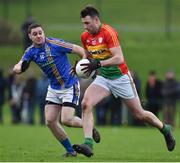 30 December 2017; Eoghan Ruth of Carlow in action against Seanie Furlong of Wicklow during the Bord na Móna O'Byrne Cup Group 3 First Round match between Wicklow and Carlow at Bray Emmets GAA Club, Bray in Wicklow. Photo by Matt Browne/Sportsfile