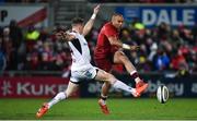 1 January 2018; Simon Zebo of Munster kicks under pressure from Craig Gilroy of Ulster during the Guinness PRO14 Round 12 match between Ulster and Munster at Kingspan Stadium in Belfast. Photo by David Fitzgerald/Sportsfile