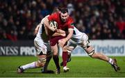 1 January 2018; Duncan Williams of Munster is tackled by Alan O'Connor, left, and Nick Timoney of Ulster during the Guinness PRO14 Round 12 match between Ulster and Munster at Kingspan Stadium in Belfast. Photo by David Fitzgerald/Sportsfile