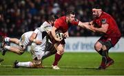 1 January 2018; Duncan Williams of Munster is tackled by Alan O'Connor, behind, and Nick Timoney of Ulster during the Guinness PRO14 Round 12 match between Ulster and Munster at Kingspan Stadium in Belfast. Photo by David Fitzgerald/Sportsfile