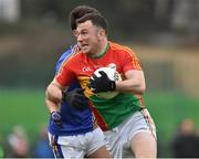 30 December 2017; Darragh Foley of Carlow in action against Ross O'Brien of Wicklow during the Bord na Móna O'Byrne Cup Group 3 First Round match between Wicklow and Carlow at Bray Emmets GAA Club, Bray in Wicklow. Photo by Matt Browne/Sportsfile