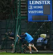 2 January 2018; Leinster players, including Jordi Murphy, right, and Robbie Henshaw push an observation tower during Leinster Rugby squad training at UCD in Dublin. Photo by Ramsey Cardy/Sportsfile