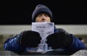 3 January 2018; Dublin supporter Mike Kelly studies the team sheet prior to the Bord na Mona O'Byrne Cup Group 1 Second Round match between Dublin and Offaly at Parnell Park in Dublin. Photo by David Fitzgerald/Sportsfile